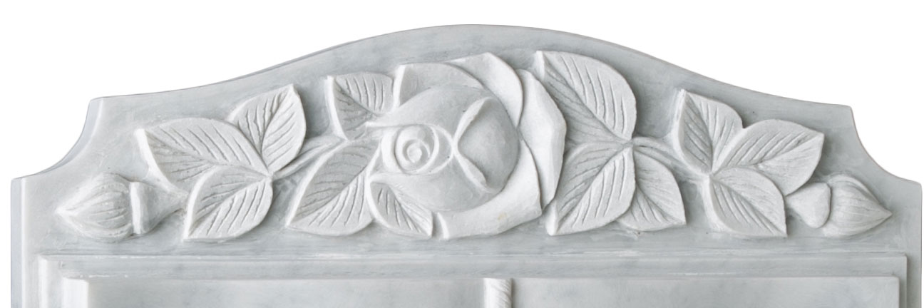 A fully worked book with carved roses